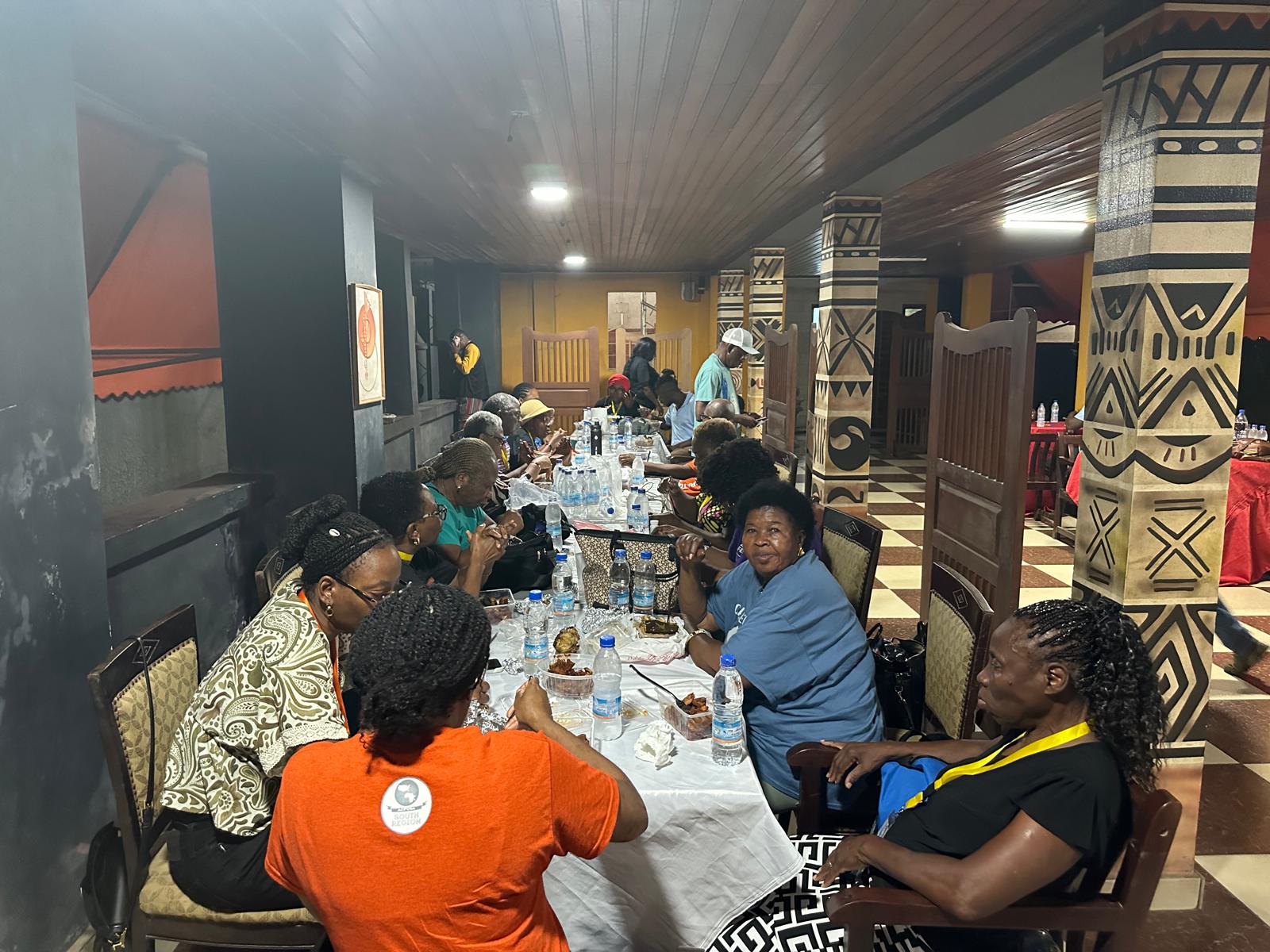 The team sharing a meal together in Abidjan